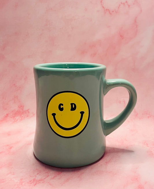 blue dont be an asshole mug with smiley face